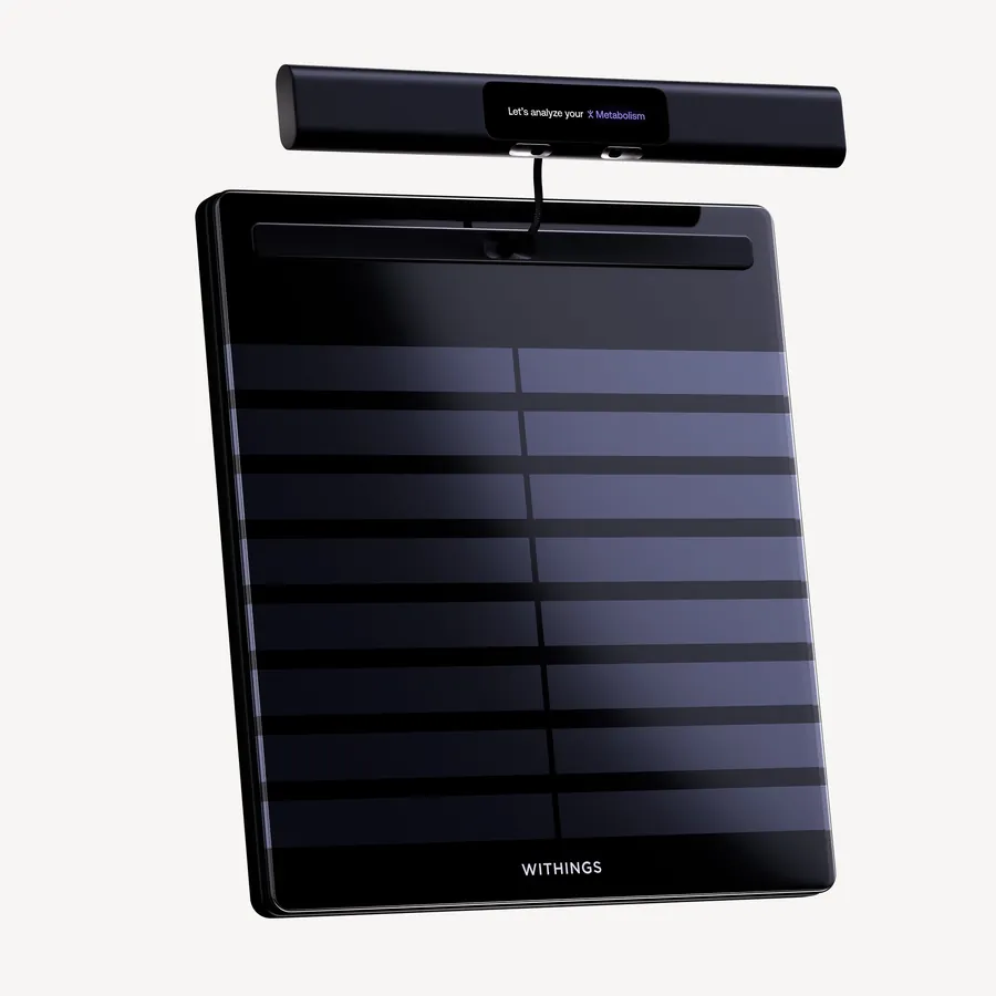 Withings BodyScan 2 en negro con el asa extendida sobre la plataforma